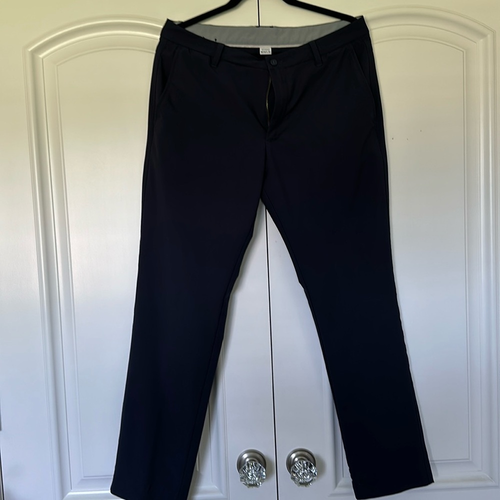 Navy blue Footjoy golf pants. Like new, size 34x30.